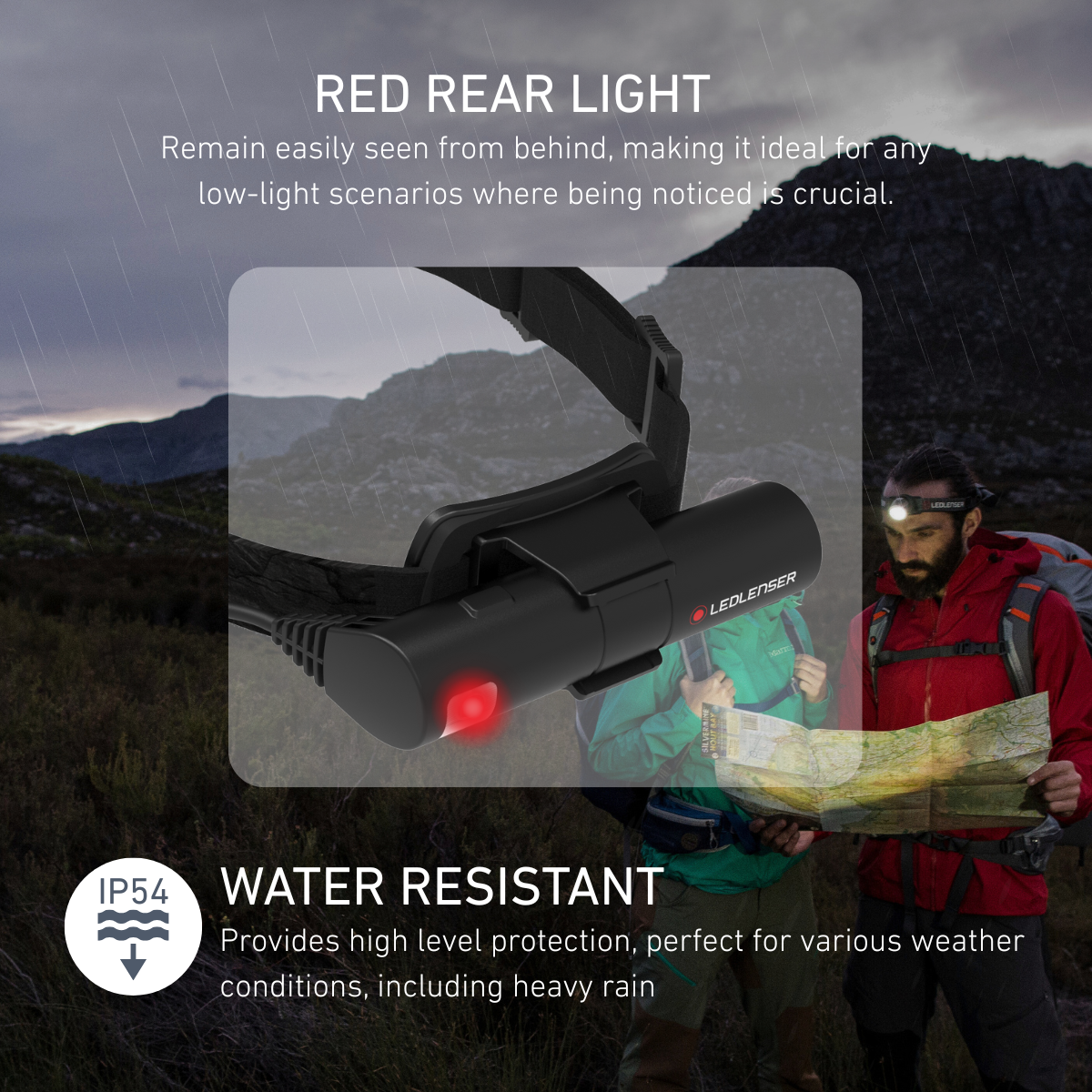 Red rear light with mountainous background and person holding a map.