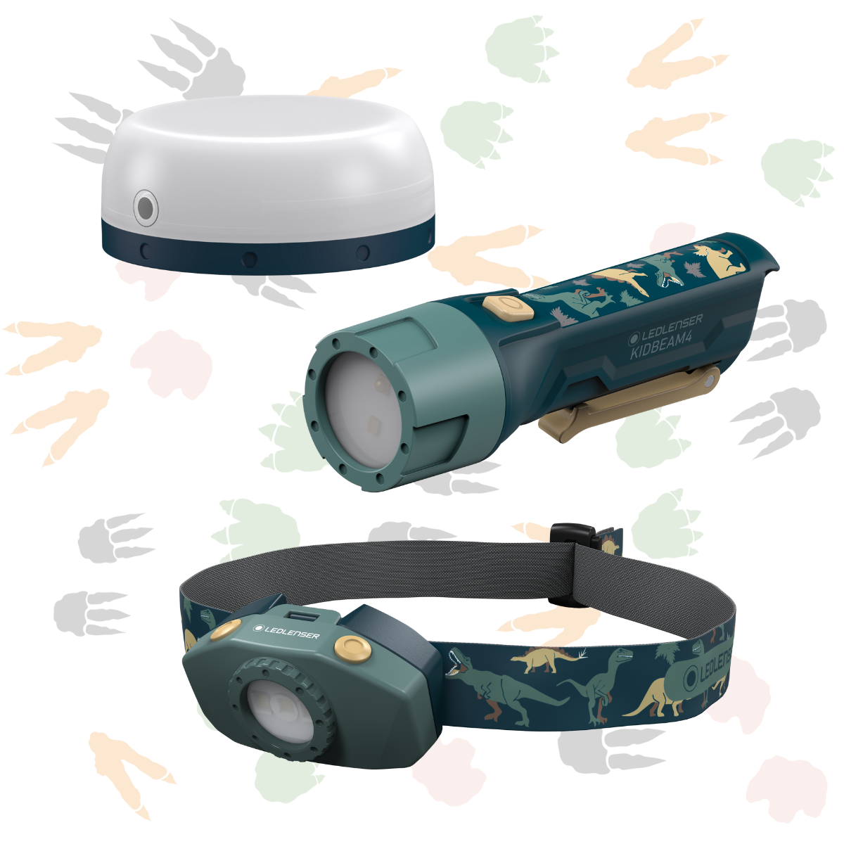 A camping light, torch and headtorch with dinosaur designs on a white background with dinosaur footprints.